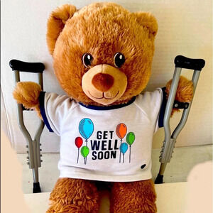 Build-A-Bear “get well soon” light brown bear with crutches!!  Balloons on shirt